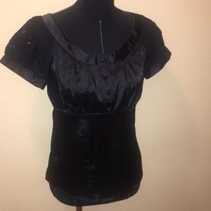 Black blouse with lace appliqué sleeves